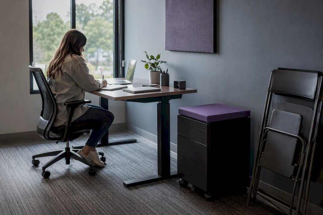 Compact ergonomic office furniture setup