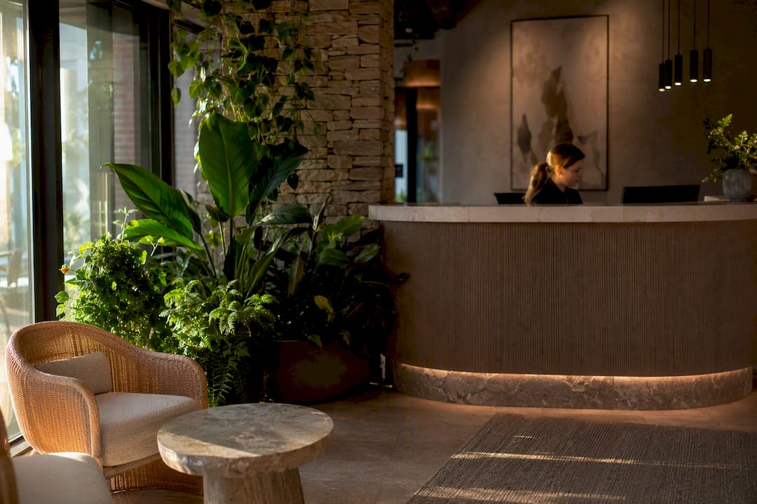 Plants and timber details in reception space
