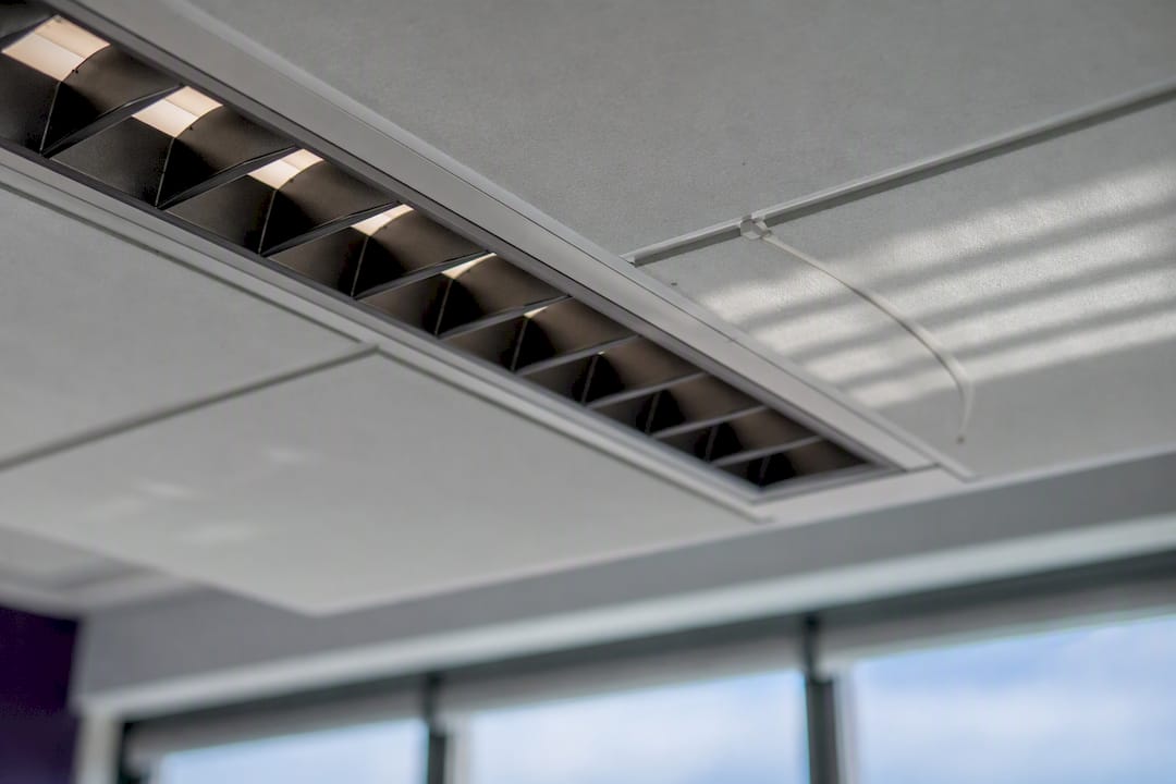 Close-up of glare control louvered office light