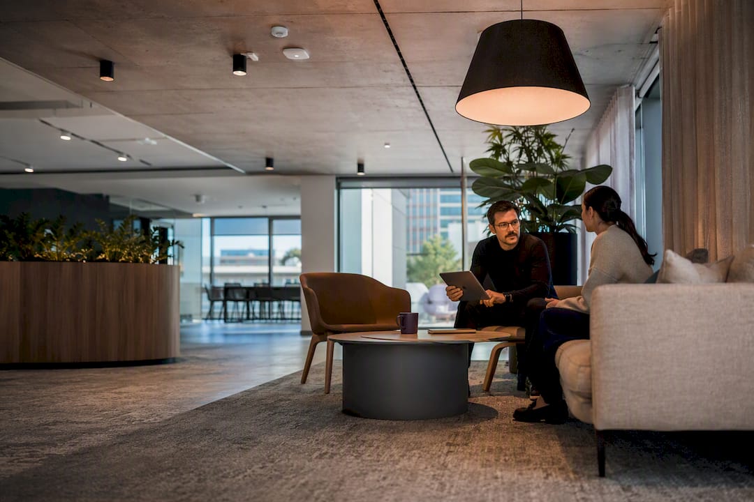 Smart office interior with discreet ceiling sensors