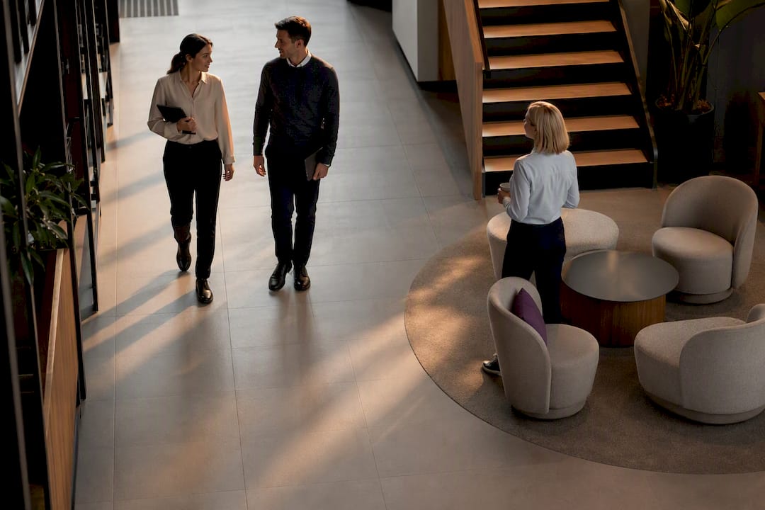 Breakout seating positioned beside office circulation