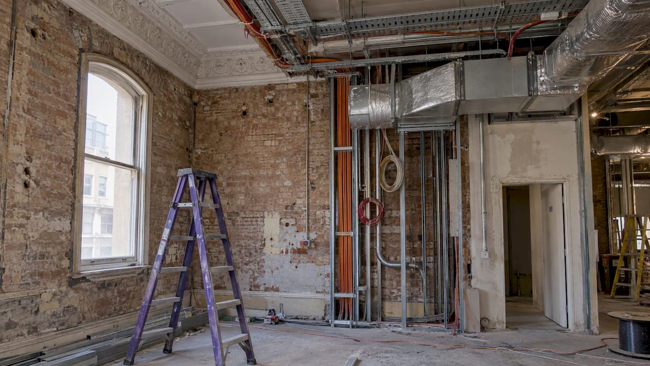 Heritage office fabric beside new building services