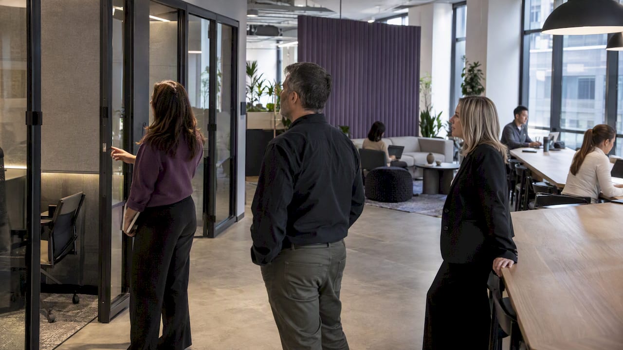 Leaders reviewing hybrid workplace zones