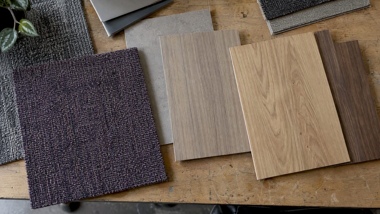 Carpet, laminate and timber finish samples together