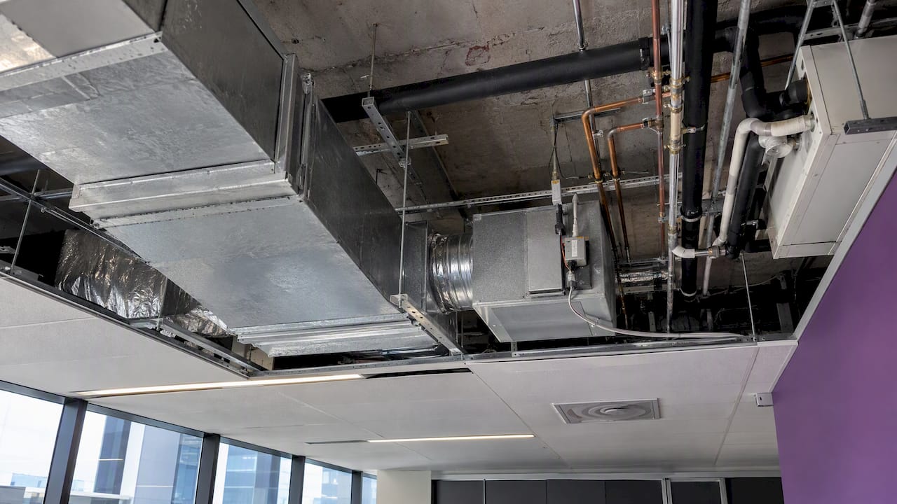 Office ceiling void showing HVAC services